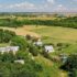 Qu&rsquo;est-ce qu&rsquo;un REIT (Real Estate Investment Trust) et devriez-vous investir dans un ?