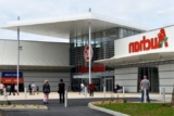 Auchan et la nouvelle ère des carburants: Comment l&rsquo;innovation en station-service façonne l&rsquo;avenir de la mobilité